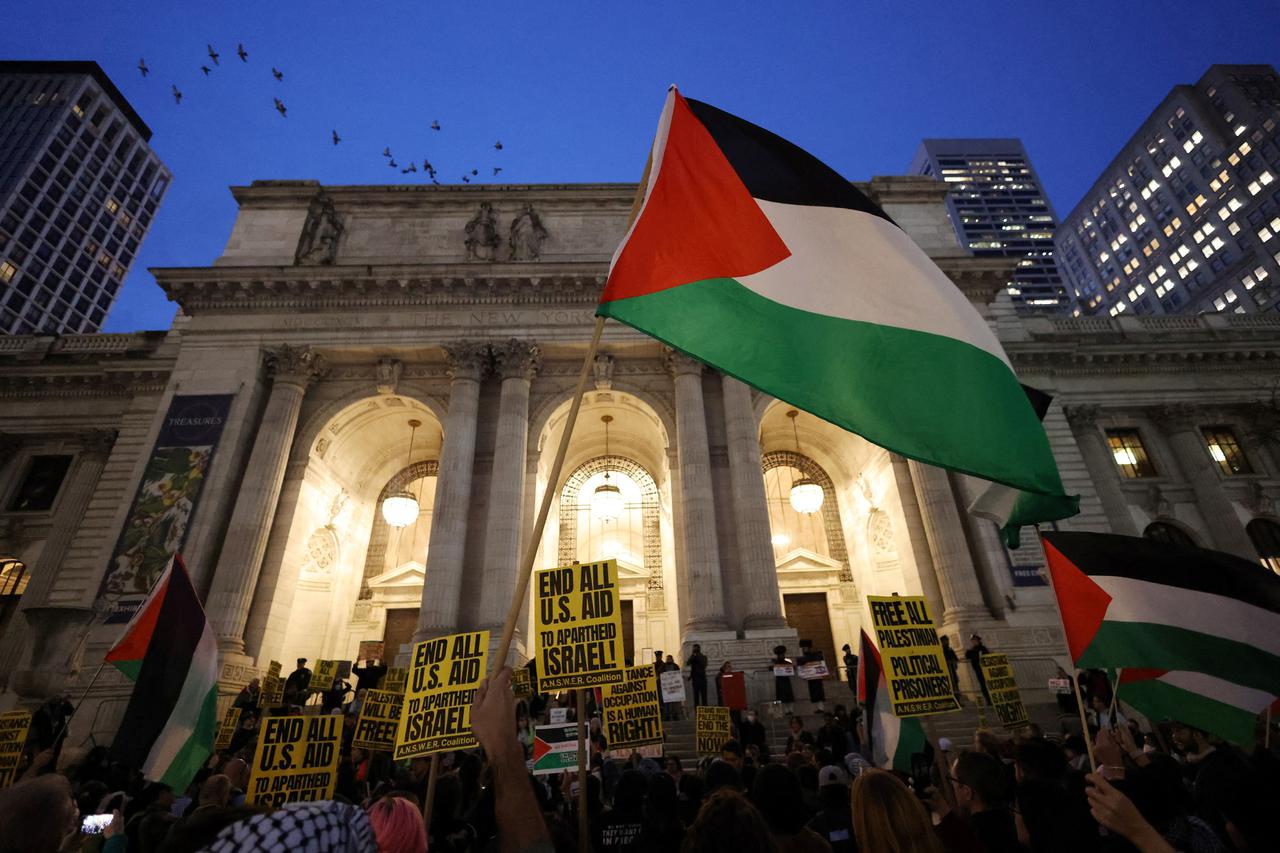People protest in support of Palestinians amid the conflict between Israel and the Palestinian Islamist group Hamas in New York