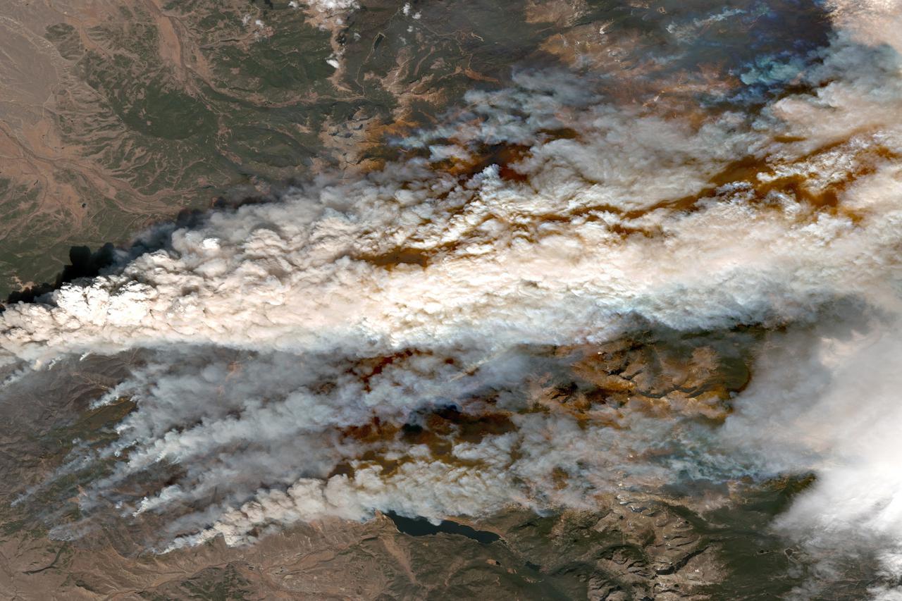 A satellite image shows an overview of the East Troublesome Fire at Grand Lake
