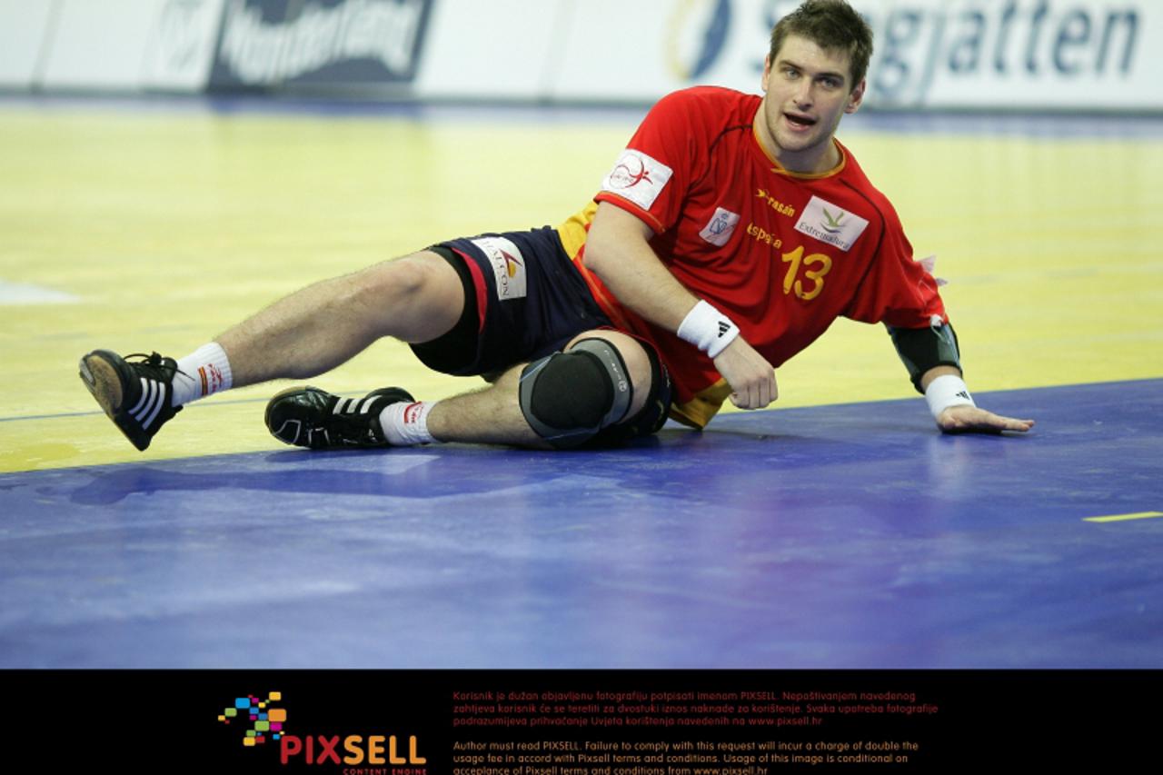 'Spain\'s Julen Aguinagalde lays on the floor during Handball Euro 2010 match Slovenia vs Spain in Innsbruck, Austria, 28 January 2010. The match ended 32-40. Photo: Jens Wolf/DPA/PIXSELL'