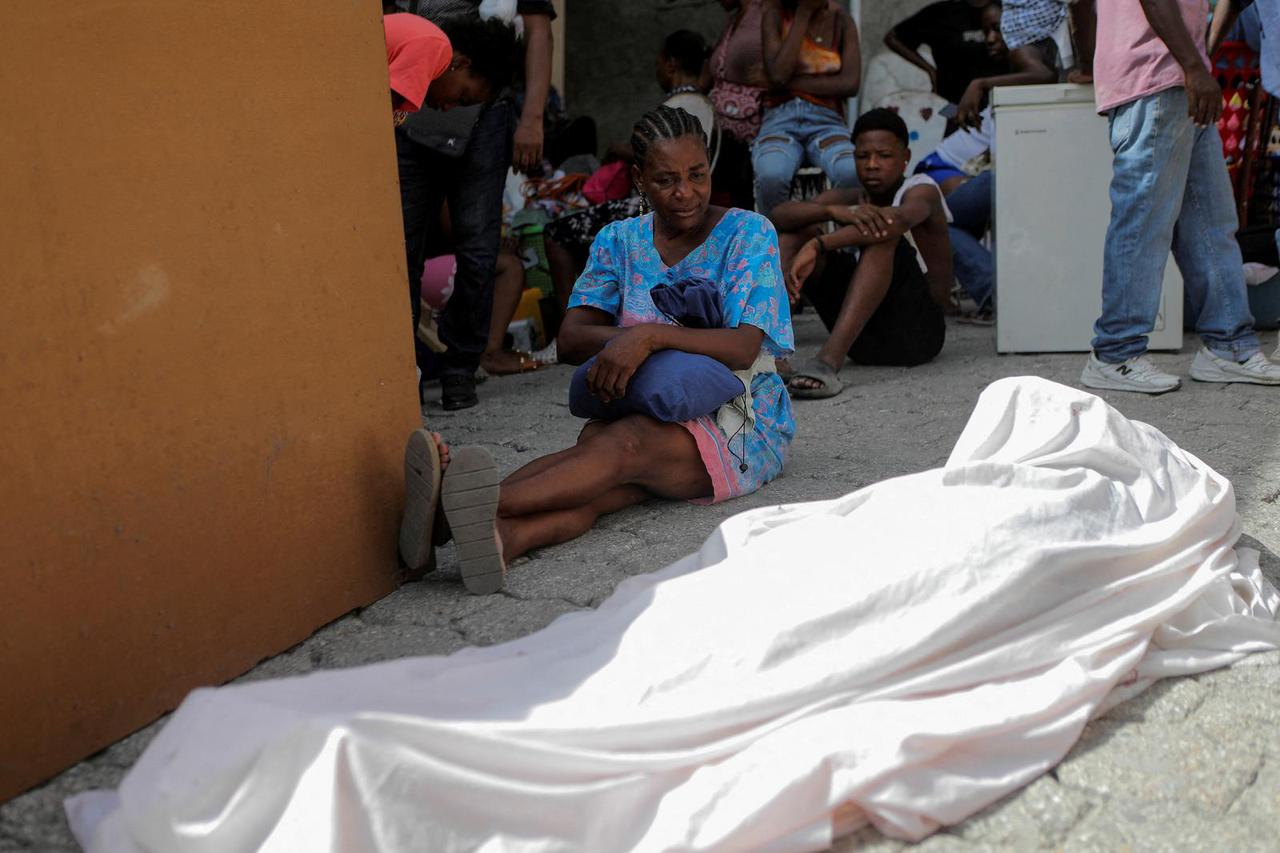 People fleeing from gang violence, in Port-au-Prince