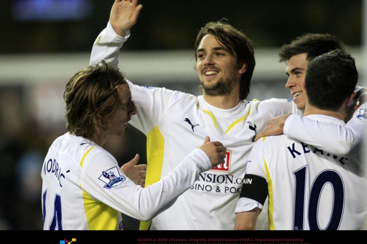 'Tottenham Hotspur\'s Niko Kranjcar is congratulated by team mates after scoring his second goal during the FA Cup Third Round match at White Hart Lane, London. Photo: Press Association/Pixsell'