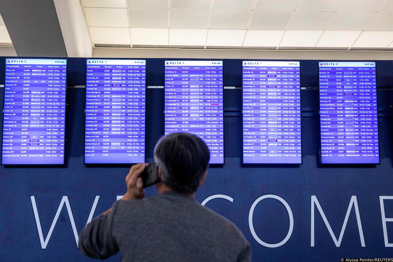 Passengers wait for the flights to resume at Hartsfield-Jackson Atlanta International Airport in Atlanta