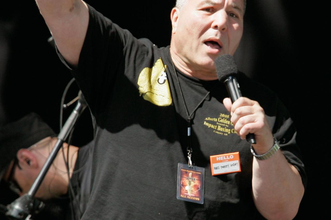 Canadian boxing legend George Chuvalo speaks at the Live 8 concert in Barrie, Ontario July 2, 2005. A galaxy of rock and roll stars will grace stages across the globe on Saturday for what is being billed as the greatest music show ever, in a bid to put pr