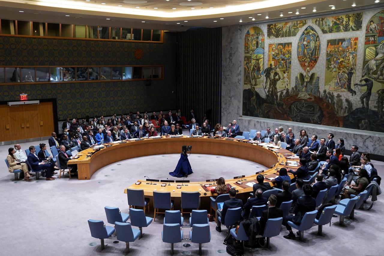 Members of the U.N. Security Council vote during a meeting on the conflict between Israel and Hamas