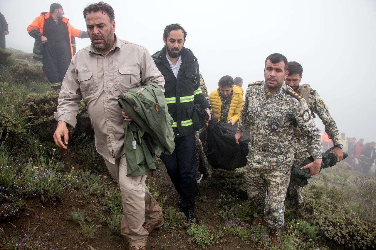 Rescue team works following a crash of a helicopter carrying Iran's President Ebrahim Raisi, in Varzaqan
