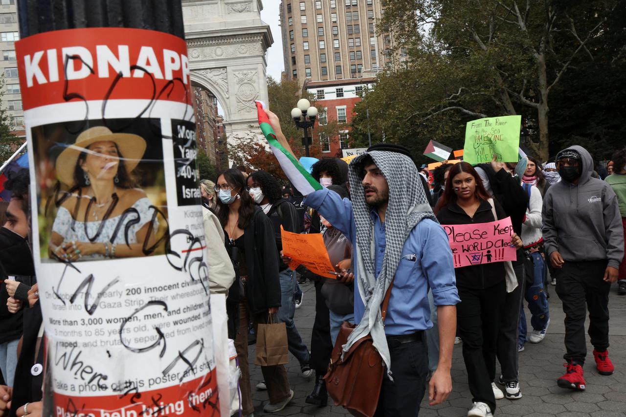 People attend a demonstration to express solidarity with Palestinians in Gaza, in New York City