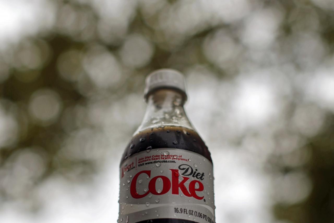 'A bottle of Diet Coke soft drink is seen in Arlington, Virginia, August 17, 2009. Coca-Cola Co's shares are set to rise as much as 20 percent, Barron's said in its August 17 edition, pointing to th