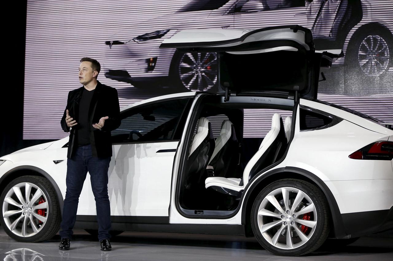 FILE PHOTO: Tesla Motors CEO Elon Musk introduces the Model X electric sports-utility vehicles during a presentation in Fremont, California