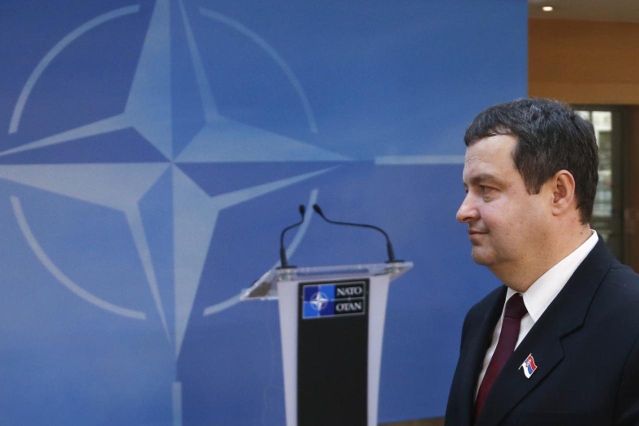 'Serbian Prime Minister Ivica Dacic arrives at NATO headquarters after meeting Kosovo's Prime Minister Hashim Thaci (not pictured) and European Union foreign policy chief Catherine Ashton (not pictur