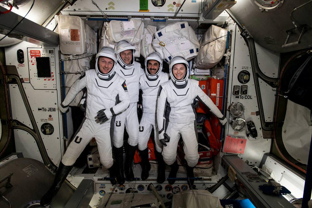 The four commercial crew astronauts representing NASA’s SpaceX Crew-3 mission are pictured in their Dragon spacesuits