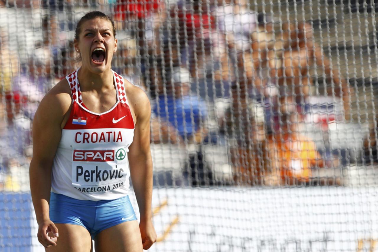 \'Sandra Perkovic of Croatia reacts after competing in the women\'s discus final at the European Athletics Championships in Barcelona July 28, 2010.     REUTERS/Dominic Ebenbichler (SPAIN  - Tags: SPO