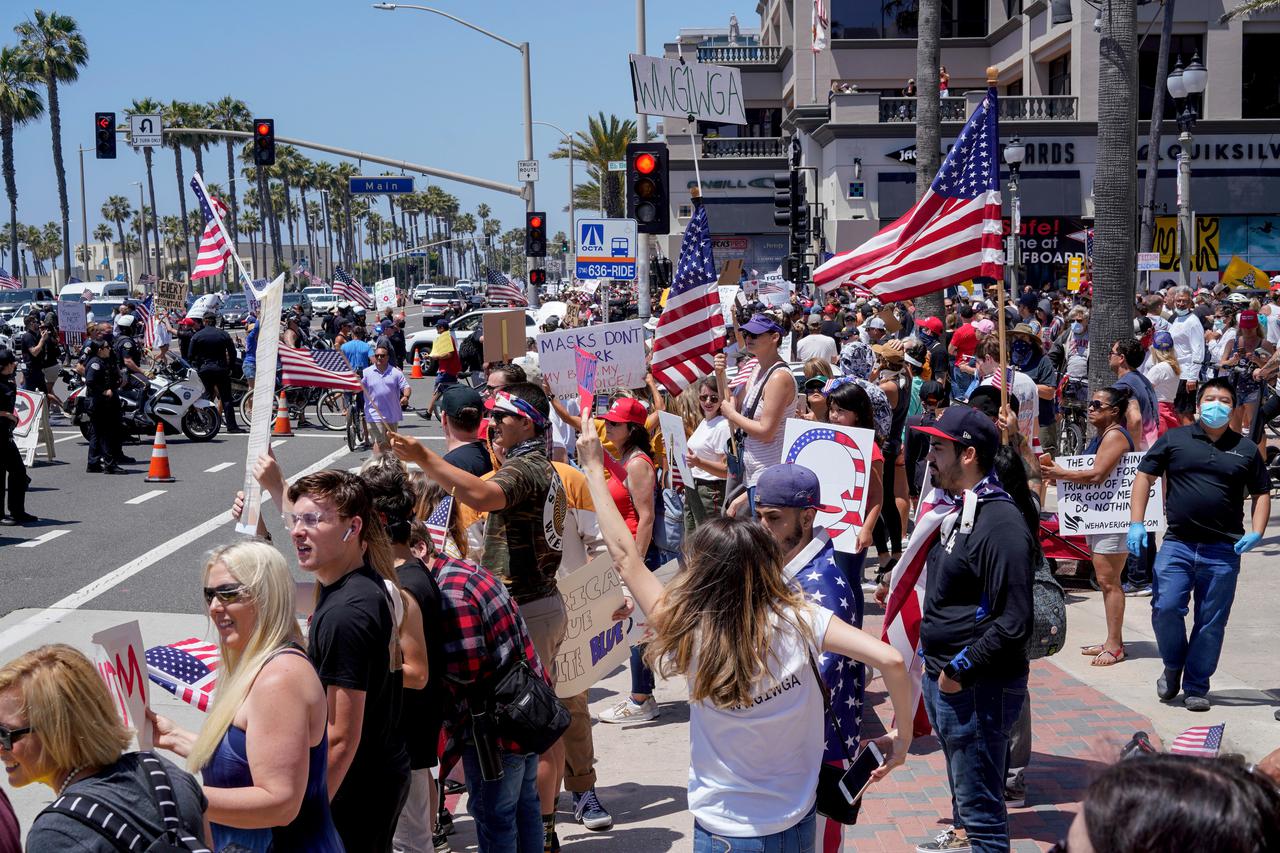 Protests during the global outbreak of the coronavirus disease (COVID-19), in Huntington Beach, California