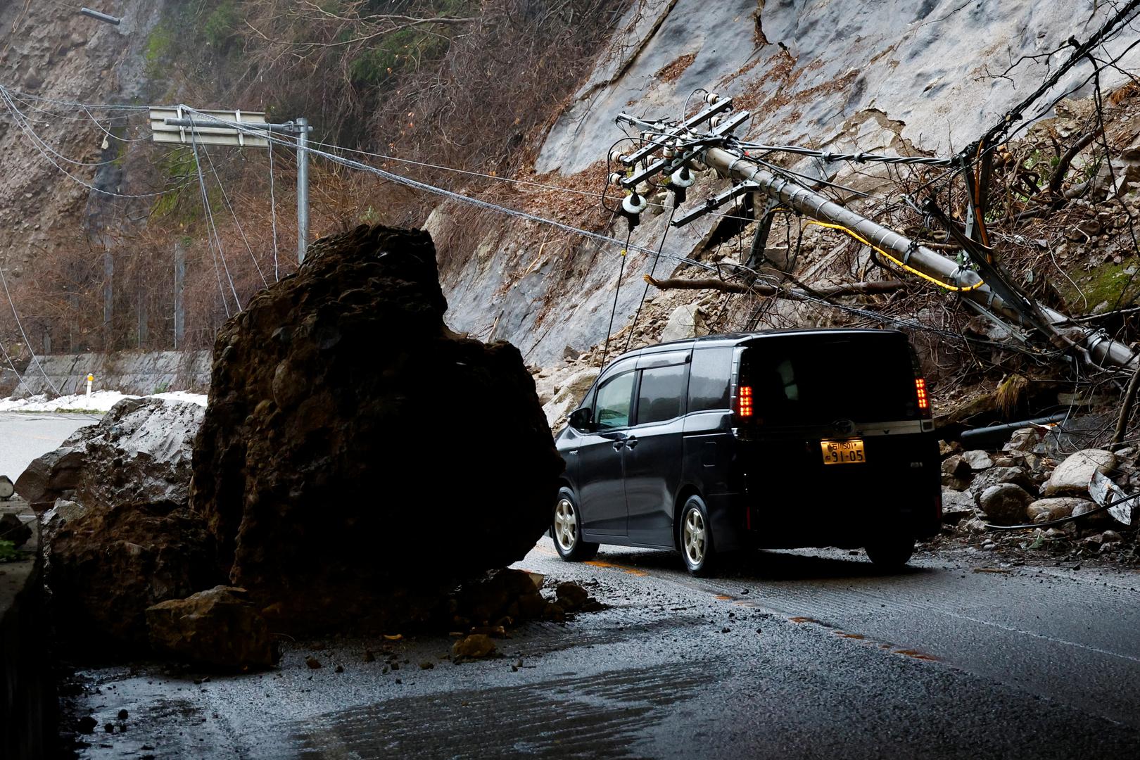 A car drives on a damaged road, in the aftermath of an earthquake, in Wajima, Japan, January 3, 2024. REUTERS/Kim Kyung-Hoon Photo: KIM KYUNG-HOON/REUTERS
