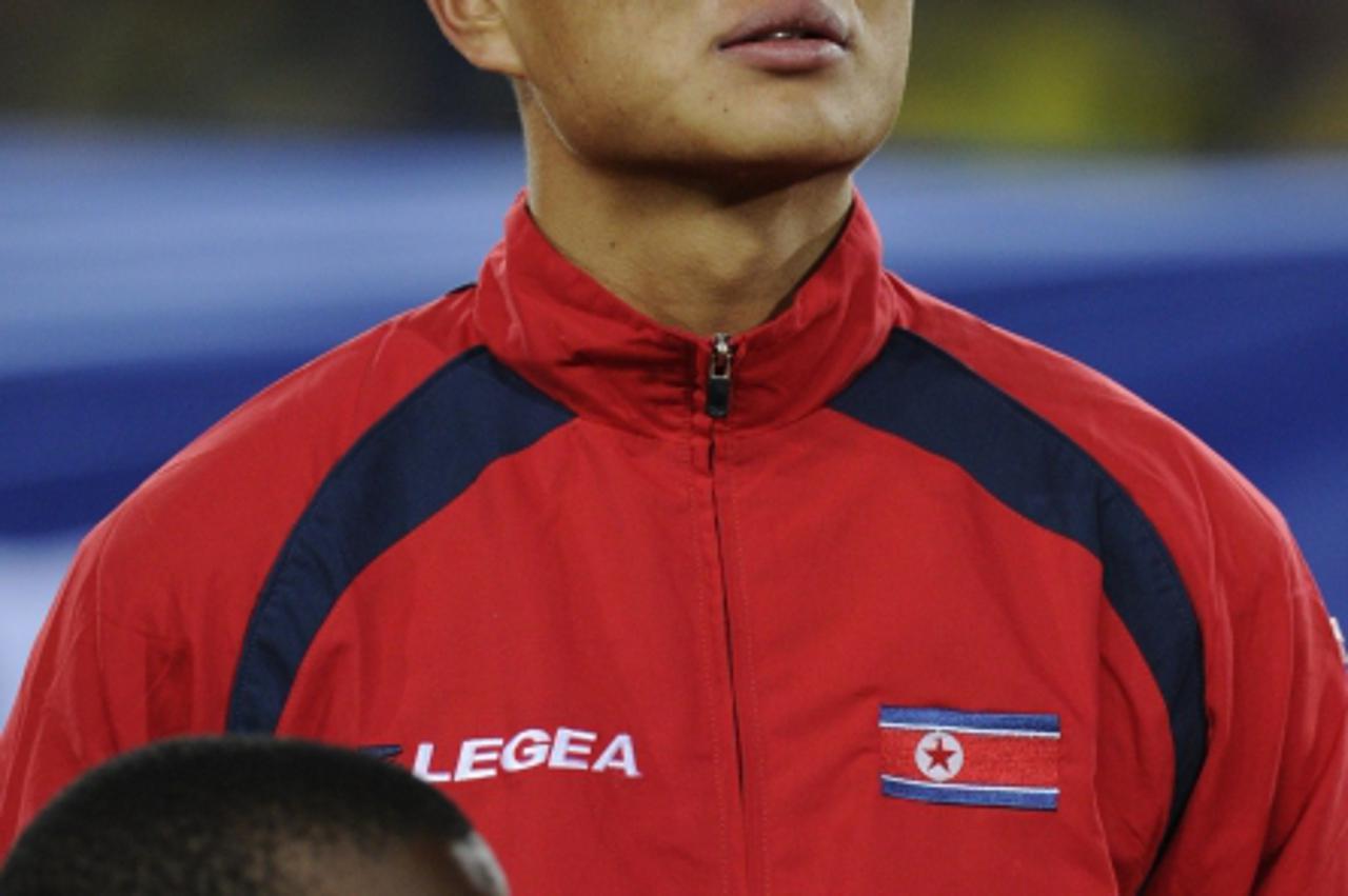 'North Korea\'s defender Jong Tae-Se sings his national anthem before their Group G first round 2010 World Cup football match against Brazil on June 15, 2010 at Ellis Park stadium in Johannesburg. NO 