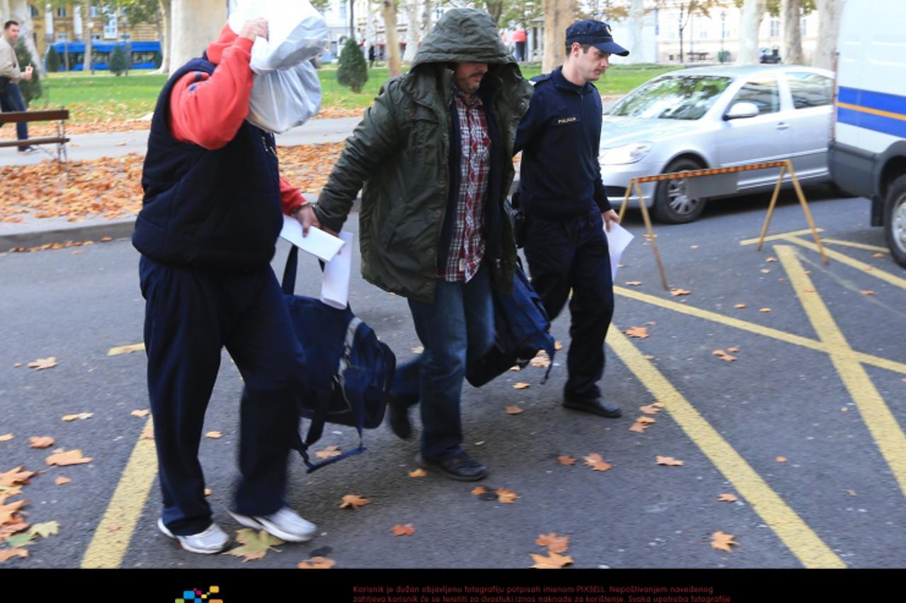 '30.10.2012., Zagreb - Privodjenje osumnjicenih za prodavanje informacija na Zupanijski sud.  Photo: Zeljko Lukunic/PIXSELL'