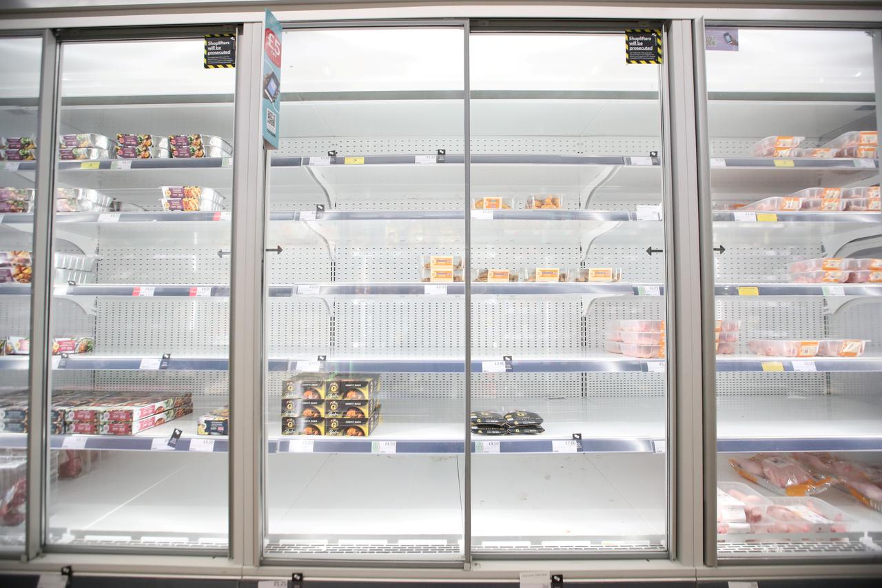 FILE PHOTO: Empty shelves are seen in the meat aisle of Co-Op supermarket, Harpenden