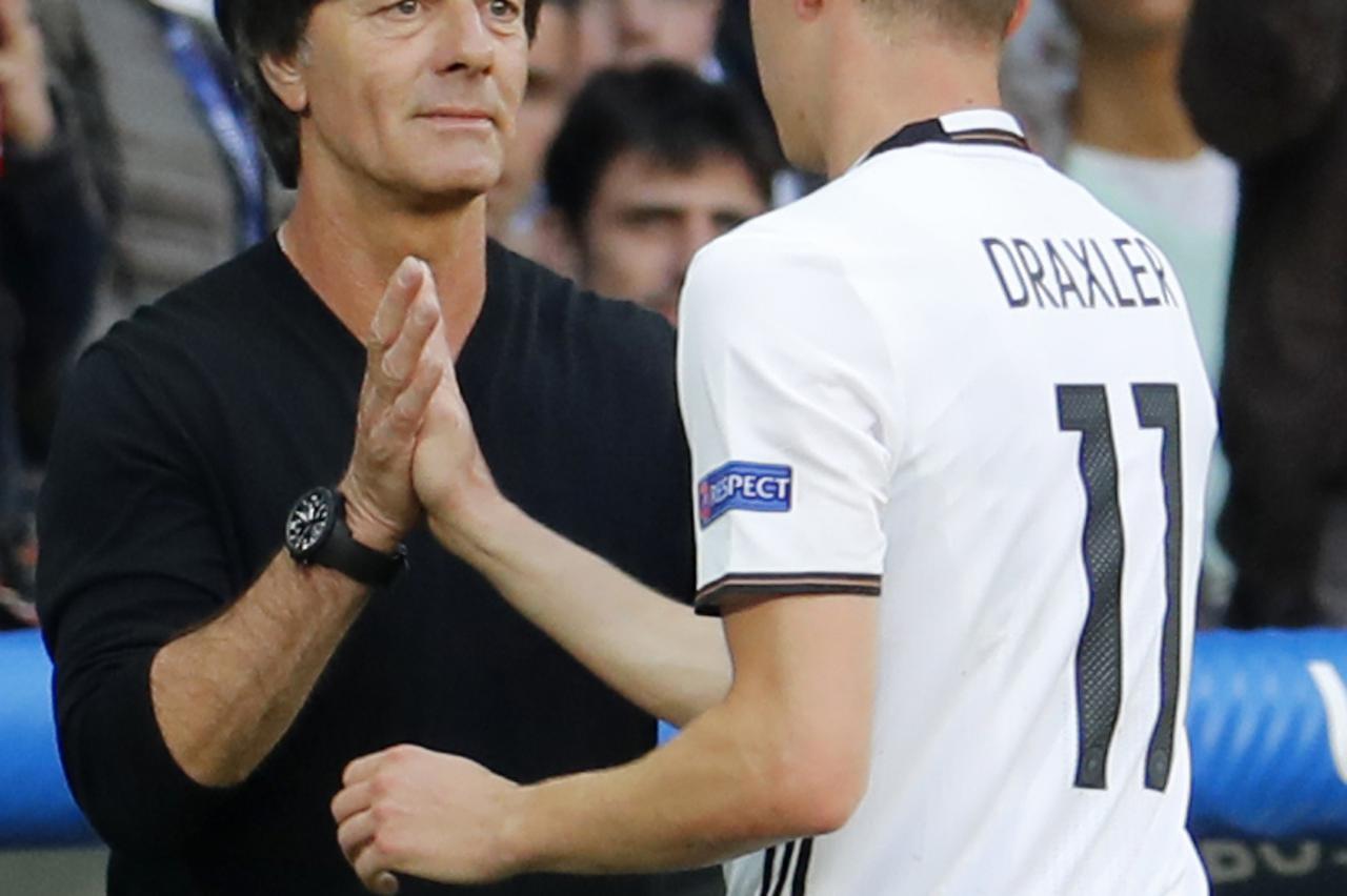 Football Soccer - Germany v Slovakia - EURO 2016 - Round of 16 - Stade Pierre-Mauroy, Lille, France - 26/6/16 Germany's Julian Draxler shakes the hand of head coach Joachim Low as he is substituted off REUTERS/Pascal Rossignol Livepic