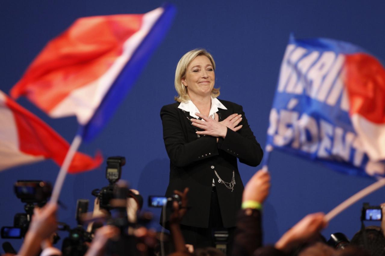 'TOPSHOTS  French far right party Front National (FN) candidate Marine Le Pen celebrates during the election night rally of her party on the evening of the first round of the 2012 French Presidential 
