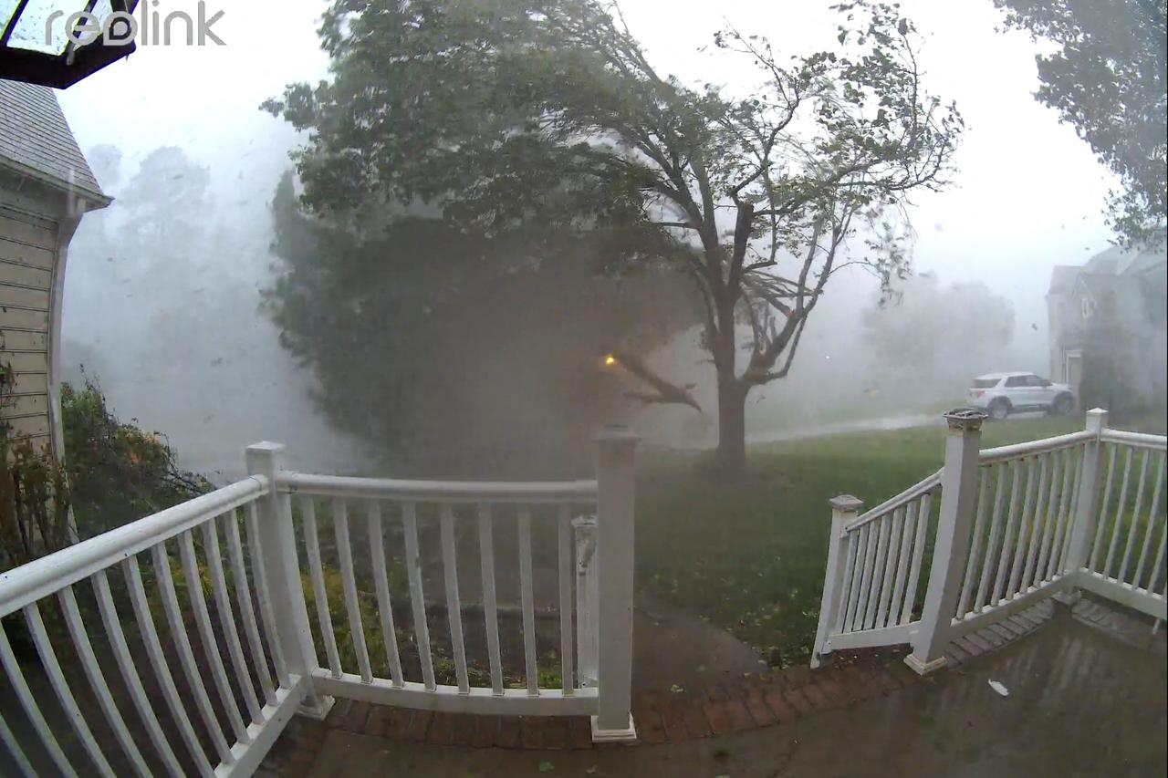 A door camera footage shows the impact of a tornado that struck Harrisburg