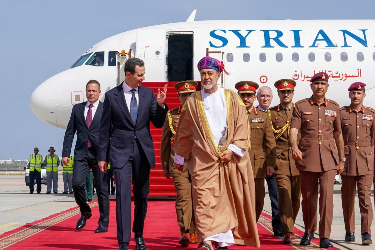 Syria's President Bashar al-Assad is welcomed by Oman's Sultan Haitham bin Tariq upon his arrival to Muscat