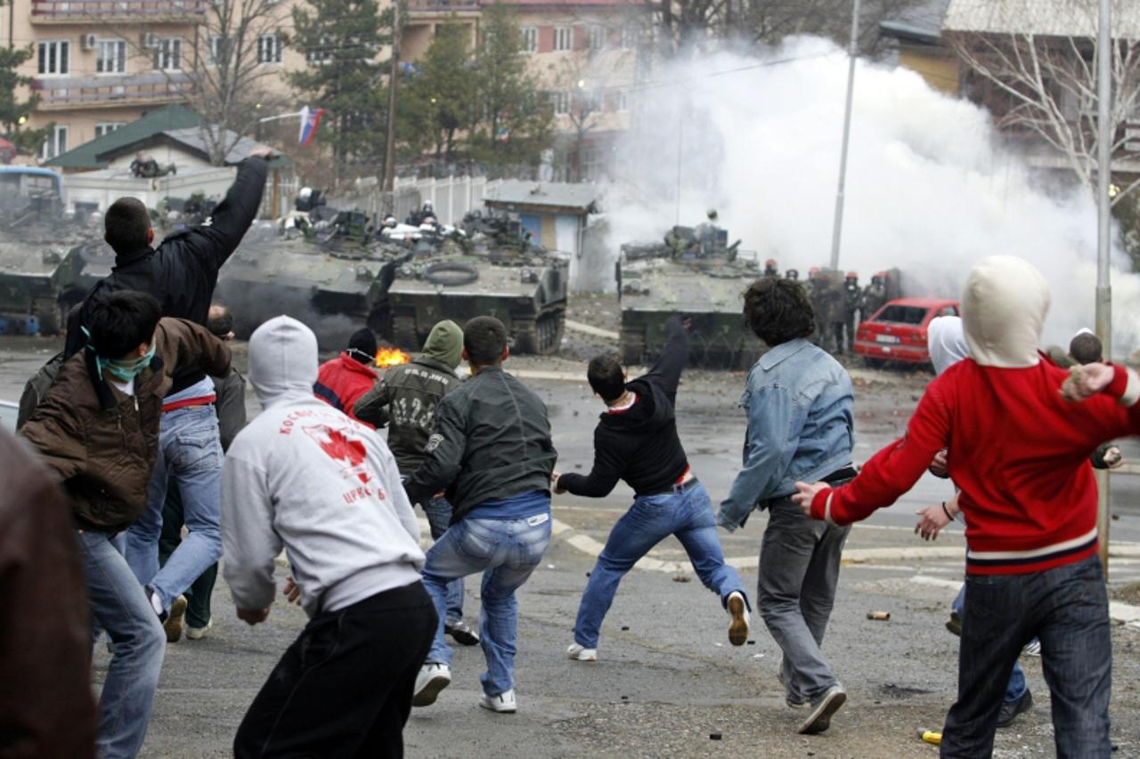'Serb protesters clash with French NATO peacekeeping troops in the ethnically divided city of Kosovska Mitrovica March 17, 2008. NATO troops came under automatic weapon fire during Serb riots in the n