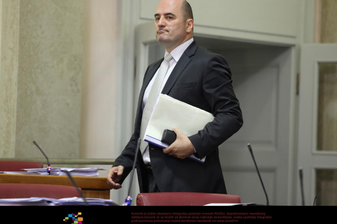 '13.07.2012., Zagreb - Sabor je glasanjem o raspravljenim tockama dnevnog reda zavrsio 4. sjednicu. Milijan Brkic. Photo: Patrik Macek/PIXSELL'
