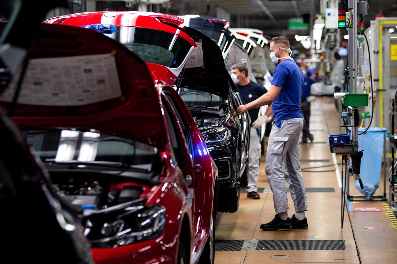 FILE PHOTO: A worker on the assembly line at Volkswagen's plant in Wolfsburg, Germany