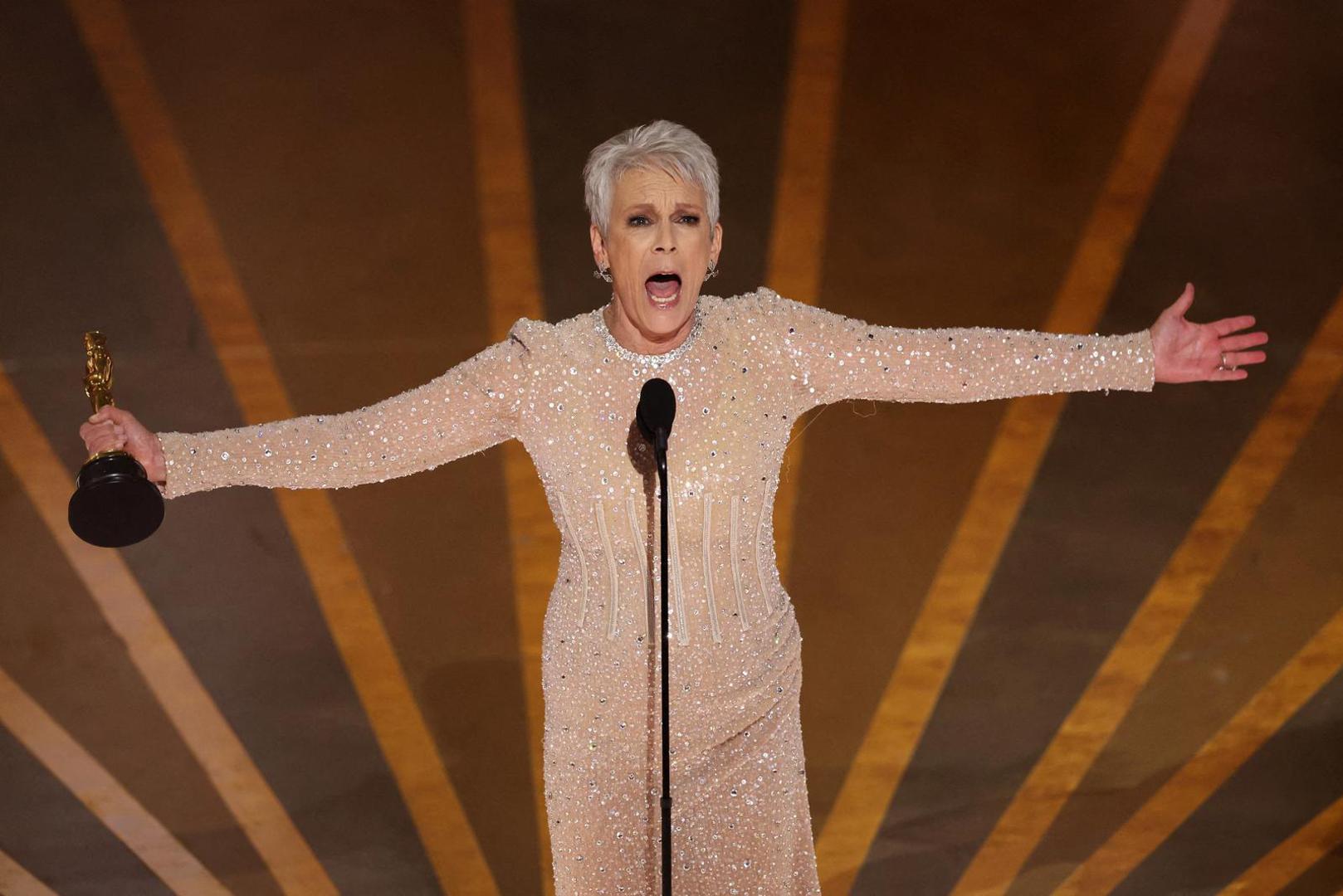Jamie Lee Curtis wins the Oscar for Best Supporting Actress for "Everything Everywhere All at Once" during the Oscars show at the 95th Academy Awards in Hollywood, Los Angeles, California, U.S., March 12, 2023. REUTERS/Carlos Barria     TPX IMAGES OF THE DAY Photo: CARLOS BARRIA/REUTERS