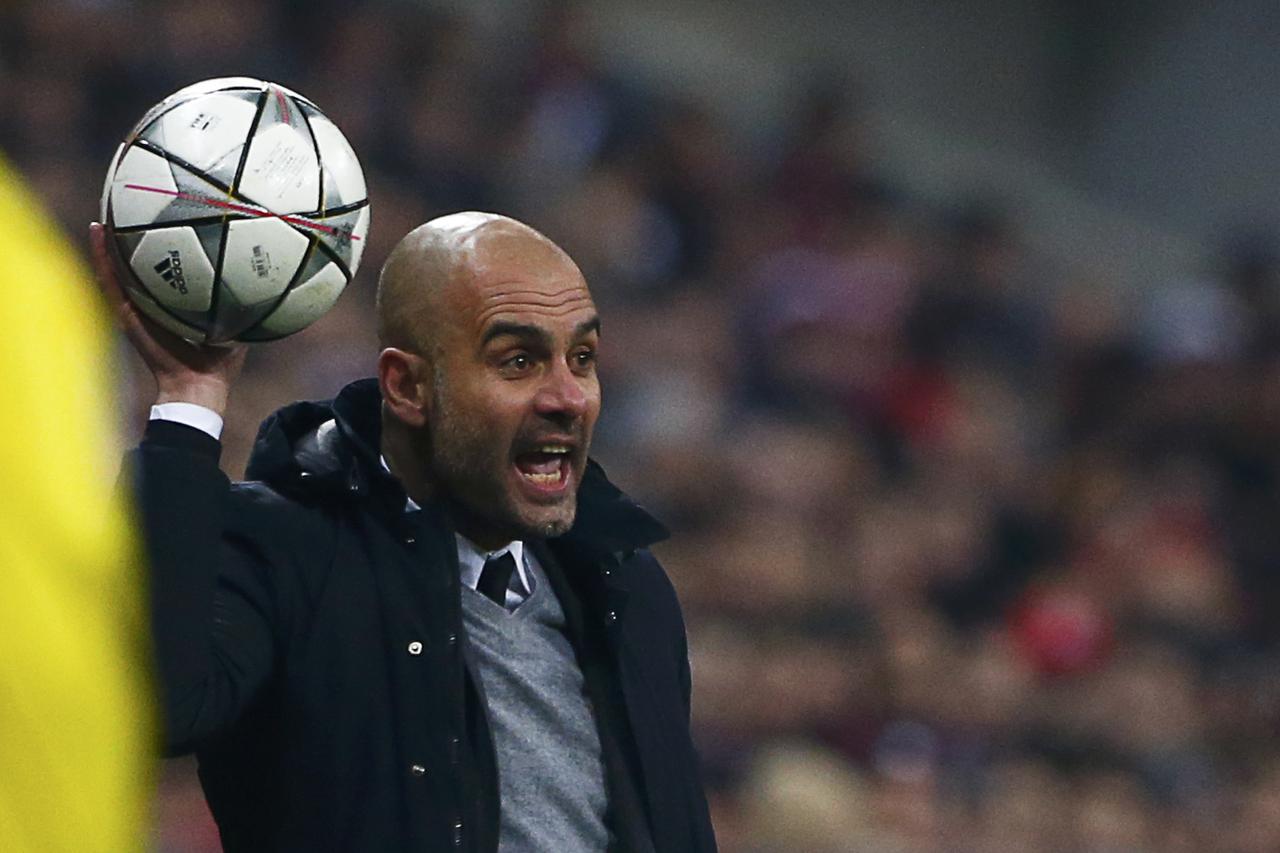 Football Soccer - Bayern Munich v Juventus - Champions League - Allianz-Arena, Munich, Germany - 16/03/16  Bayern Munich's coach Pep Guardiola throws in ball during match   REUTERS/Michaela Rehle  Picture Supplied by Action Images
