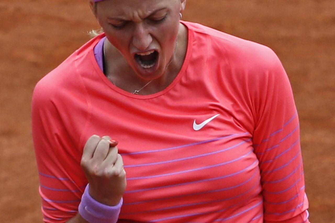 Petra Kvitova of the Czech Republic reacts during the women's singles match against Marina Erakovic of New Zealand at the French Open tennis tournament at the Roland Garros stadium in Paris, France, May 26, 2015.       REUTERS/Pascal Rossignol