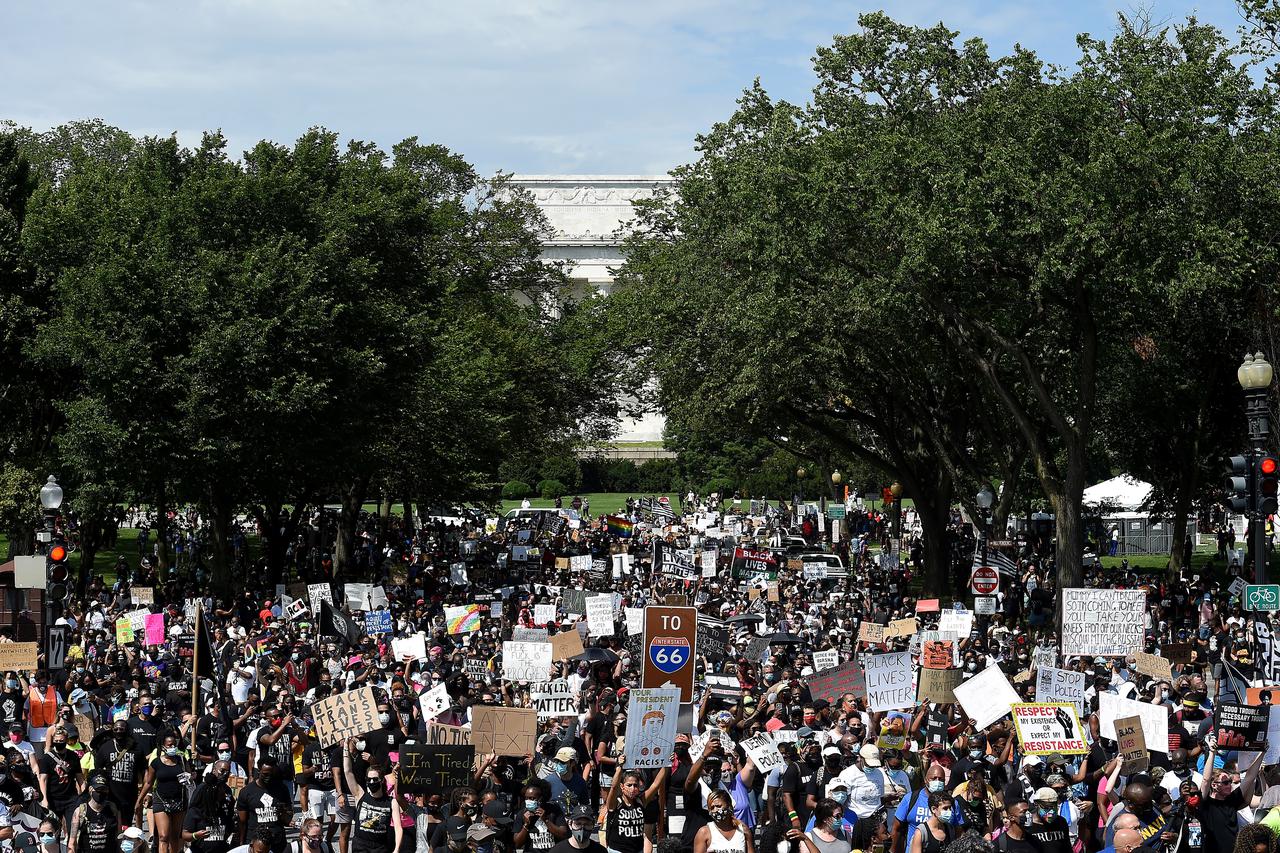 'Get Your Knee Off Our Necks' march in support of racial justice, in Washington