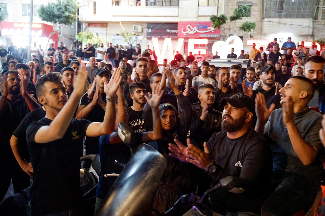 Palestinians take part in a protest in Tubas