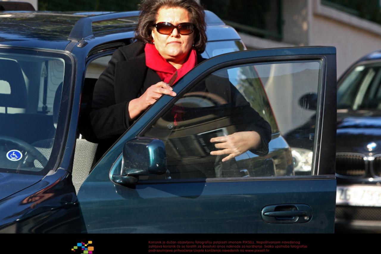 '20.12.2011., Zagreb - Mirjana Sanader stigla je u svoj dom u Kozarcevoj ulici u 12:45. Photo: Igor Kralj/PIXSELL'