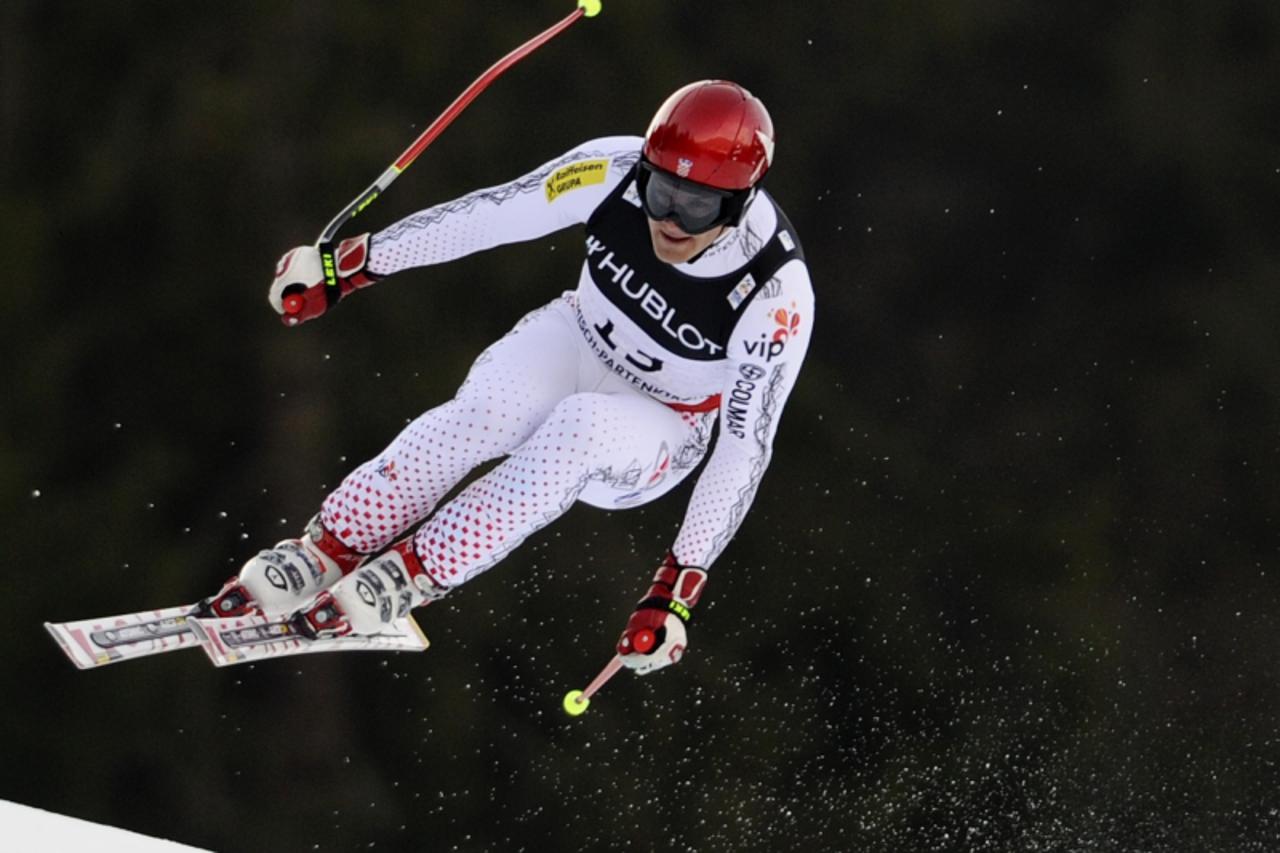 'Croatia\'s Natko Zrncic-Dim competes during the men\'s Alpine skiing World Championship Super Combined event in Garmisch Partenkirchen, southern Germany on February  14, 2011. AFP PHOTO / FABRICE COF