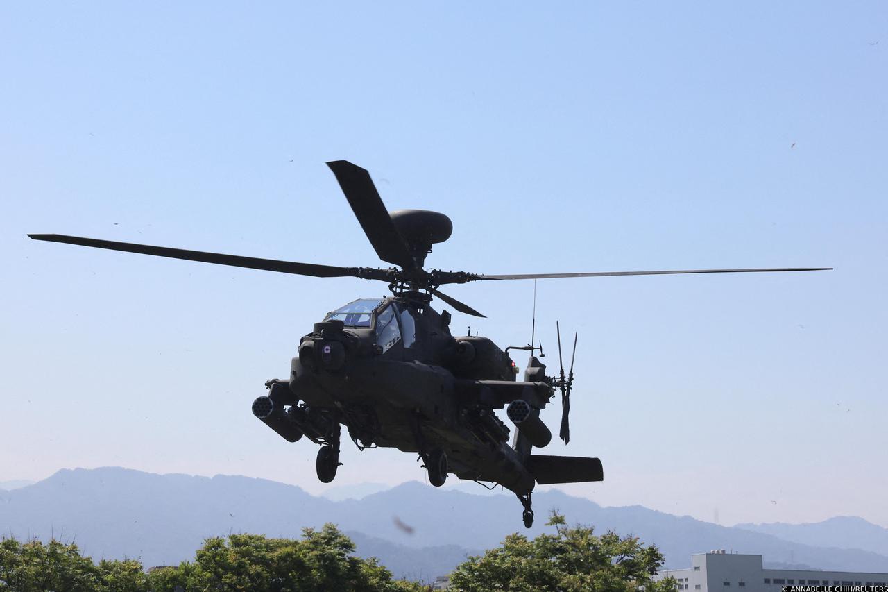 Apache helicopter takes off after a refuelling drill in New Taipei city