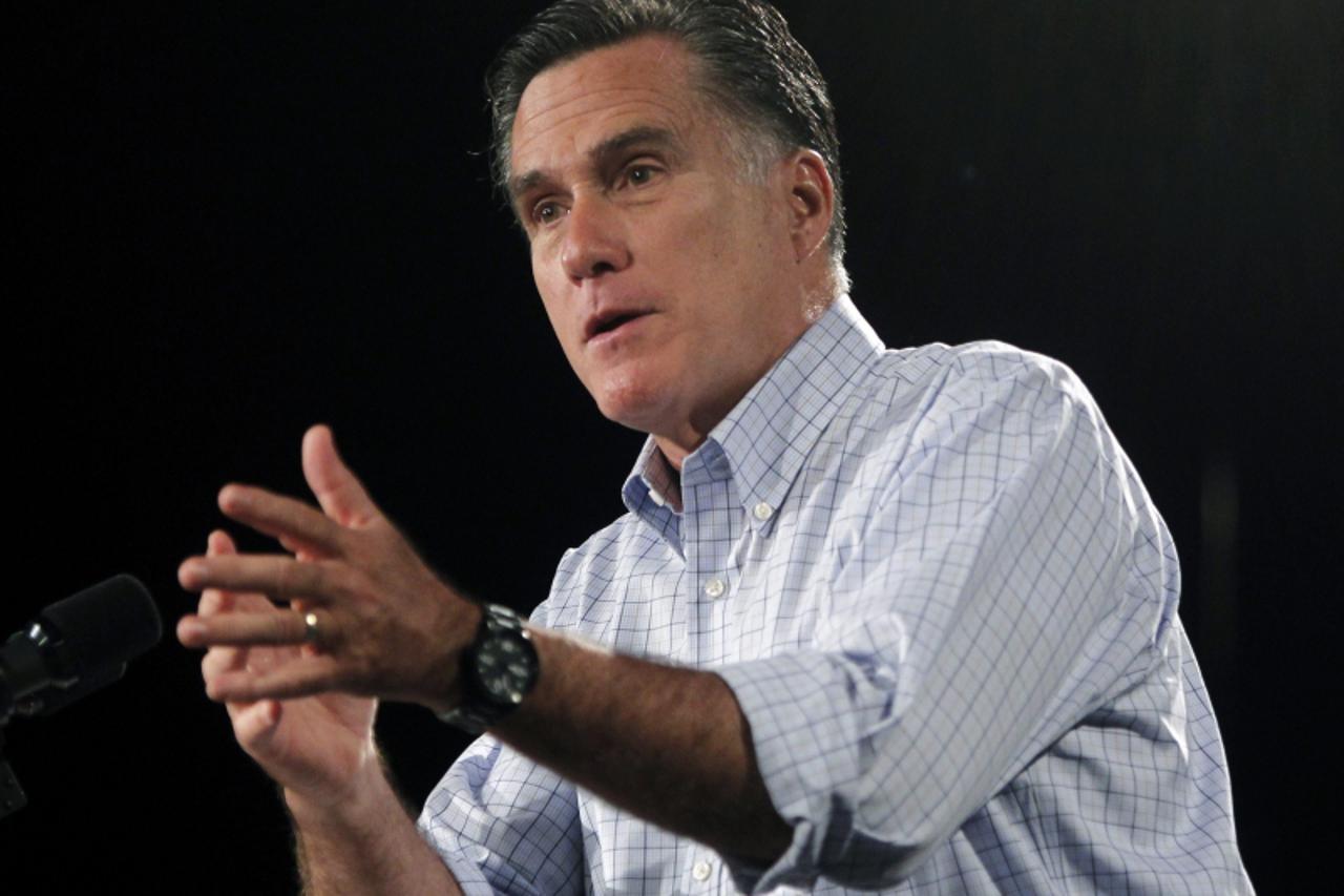 'Republican presidential candidate and former Massachusetts Governor Mitt Romney speaks to supporters during a campaign event at Central Campus High School in Des Moines, Iowa August 8, 2012. REUTERS/