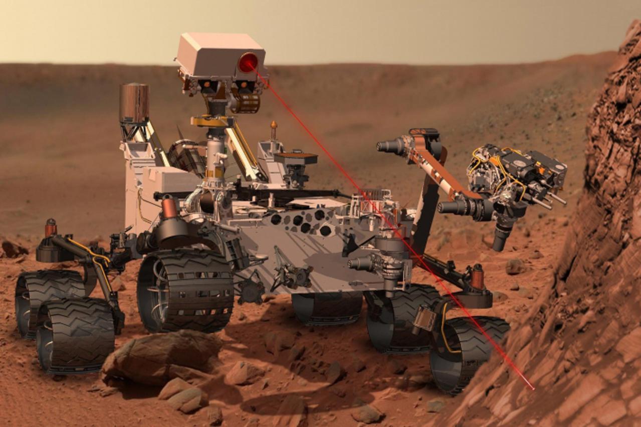 'This artist\'s concept depicts the rover Curiosity, of NASA\'s Mars Science Laboratory mission, as it uses its Chemistry and Camera (ChemCam) instrument to investigate the composition of a rock surfa