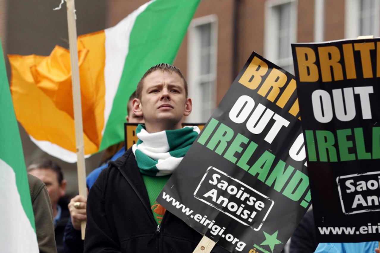'Members of Republican group Eirigi gather on O'Connell street in Dublin to demonstrate against the visit of Britain's Queen to Ireland, May 15, 2011. Bitain's Queen Elizabeth will make a four-day 