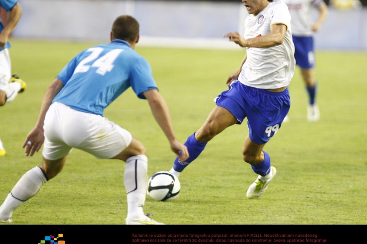 '07.08.2011., Split - Nogometna utakmica 3. kola 1. HNL, NK Hajduk - NK Rijeka. Anas Sharbini i Andro Svrljuga. Photo: Ivo Cagalj/PIXSELL'
