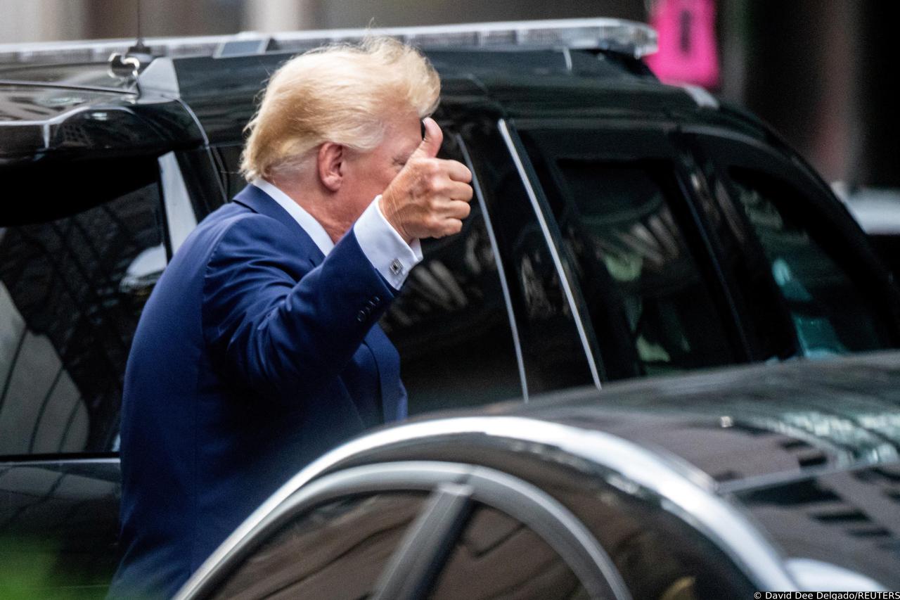 FILE PHOTO: Former U.S. President Donald Trump departs Trump Tower for a deposition two days after FBI agents raided his Mar-a-Lago Palm Beach home