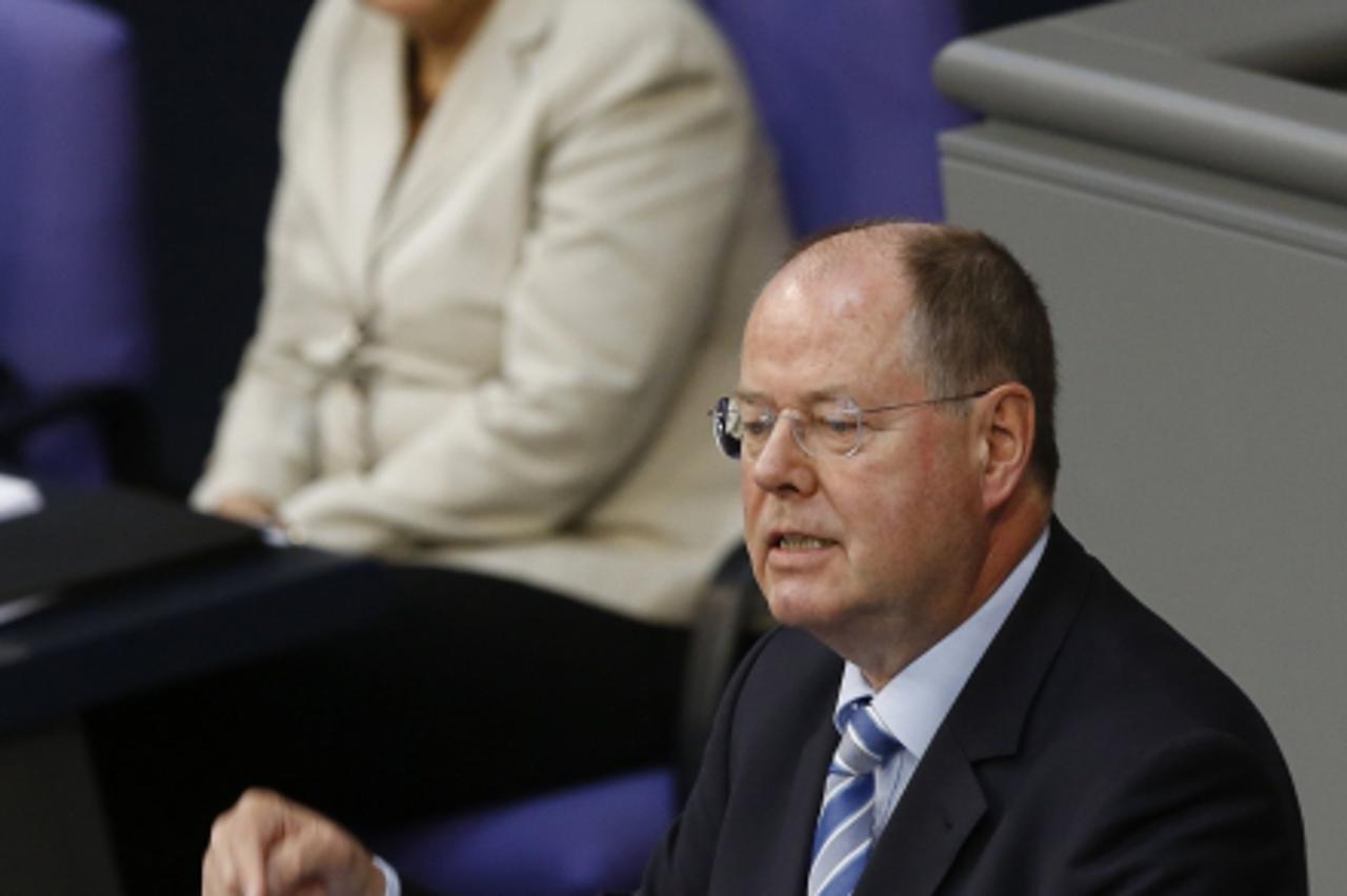 'Chancellor candidate of the Social Democratic party (SPD) Peer Steinbrueck replies to German Chancellor Angela Merkel\'s government policy statement in the lower house of parliament, the Bundestag, i