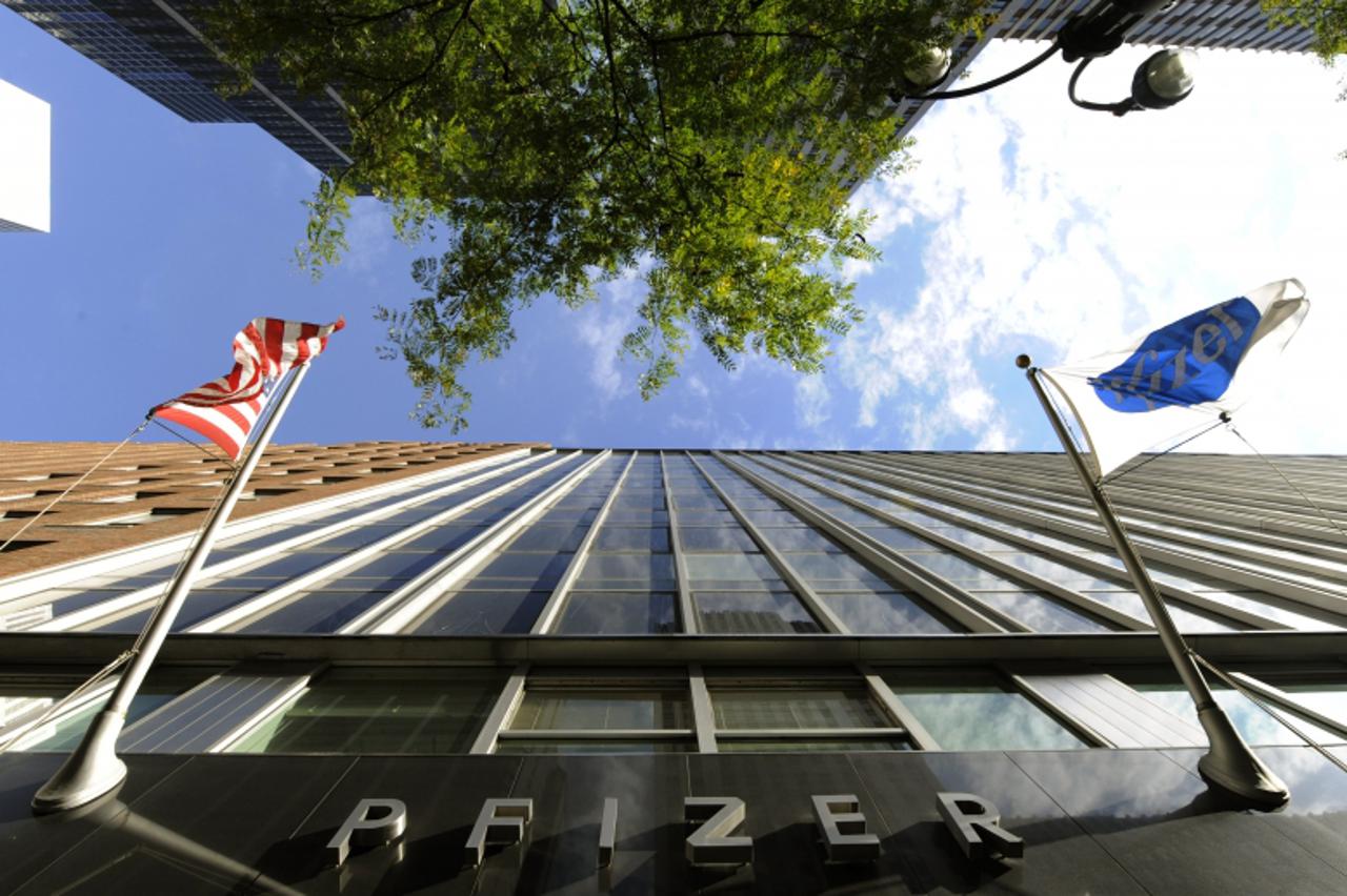 'Pharmaceutical company Pfizer Incorporated headquarters is seen on 42 Street in New York October 20, 2009. Pharmaceutical industry leader Pfizer said Tuesday third-quarter profits rose 26 percent fro