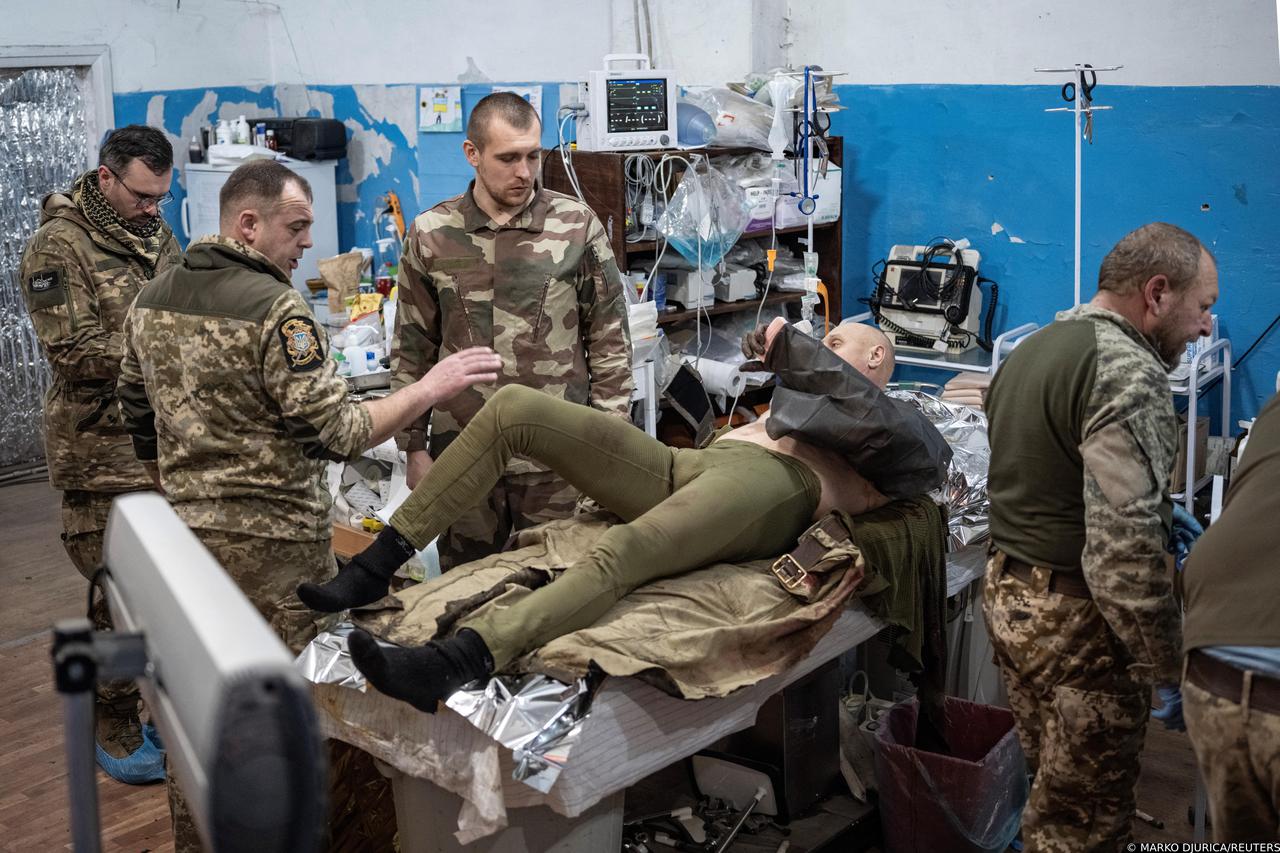 The Wider Image: Ukrainian army medics fight to save lives near frontline