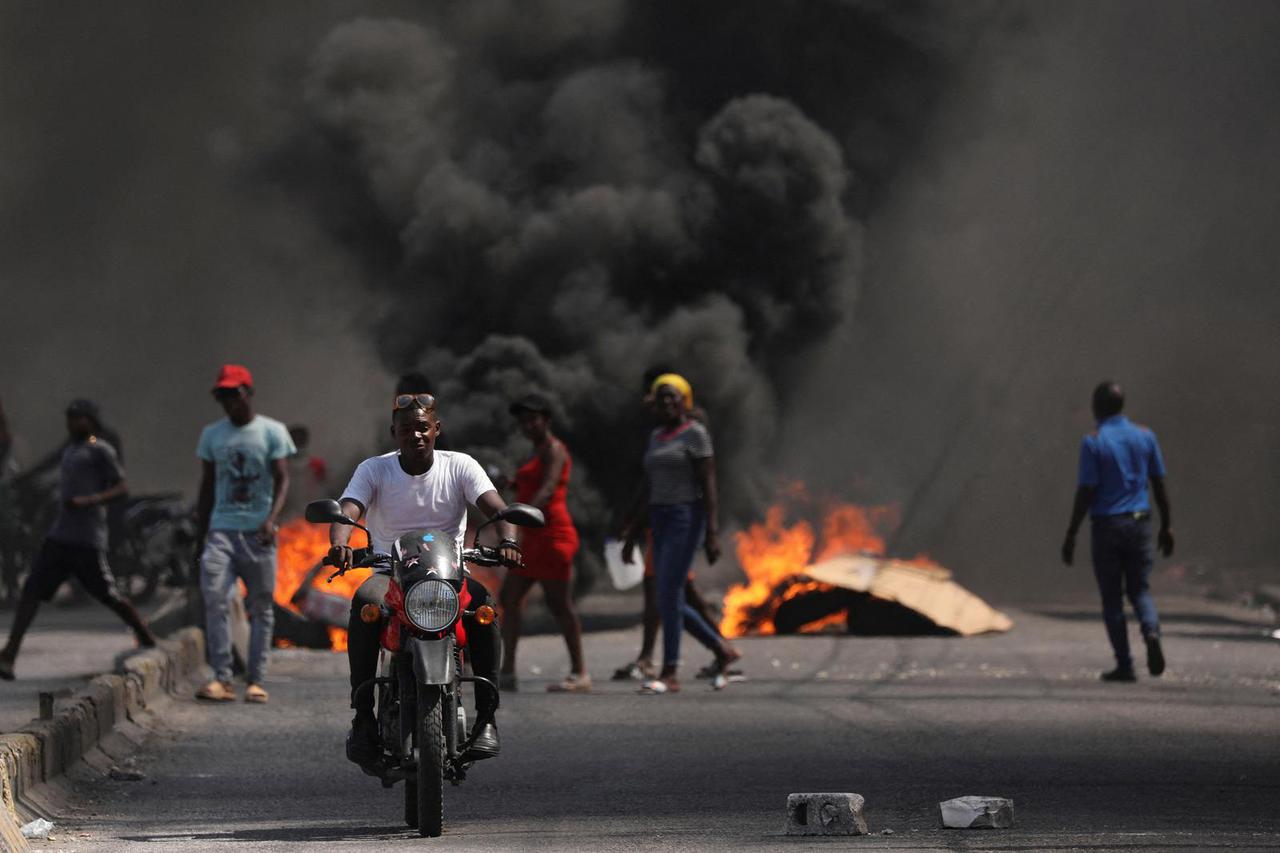 FILE PHOTO: People demonstrate against the government and insecurity in Port-au-Prince