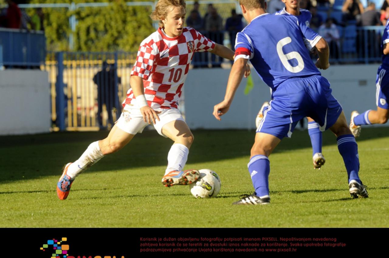 '14.10.2012., Sinj - U-17, kvalifikacije za Euro, Hrvatska - Izrael. Alen Halilovic i Glazer Dan Leon.  Photo: Tino Juric/PIXSELL'