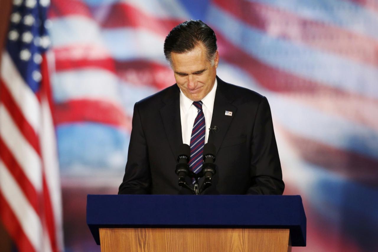 'Republican presidential nominee Mitt Romney delivers his concession speech during his election night rally in Boston, Massachusetts, November 7, 2012.     REUTERS/Mike Segar (UNITED STATES - Tags: PO