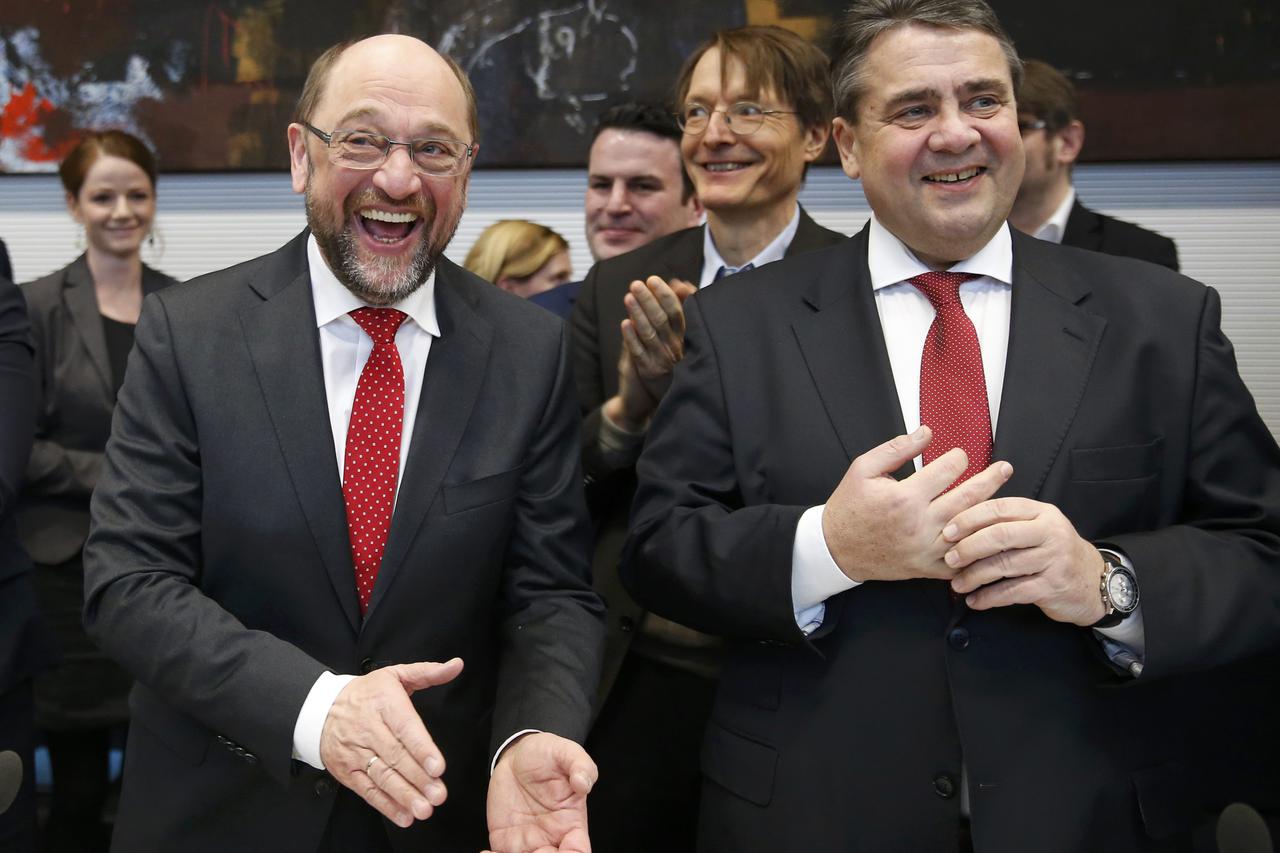 Former European Parliament president Martin Schulz and German Economy Minister Sigmar Gabriel attend a Social Democratic Party SPD parliamentary fraction meeting in Berlin, Germany, January 25, 2017.     REUTERS/Fabrizio Bensch     TPX IMAGES OF THE DAY