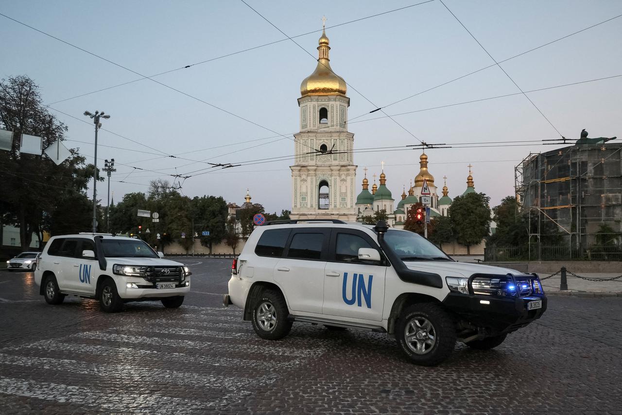FILE PHOTO: Members of IAEA mission depart for visit to Zaporizhzhia nuclear power plant amid Russia's invasion of Ukraine, in central Kyiv