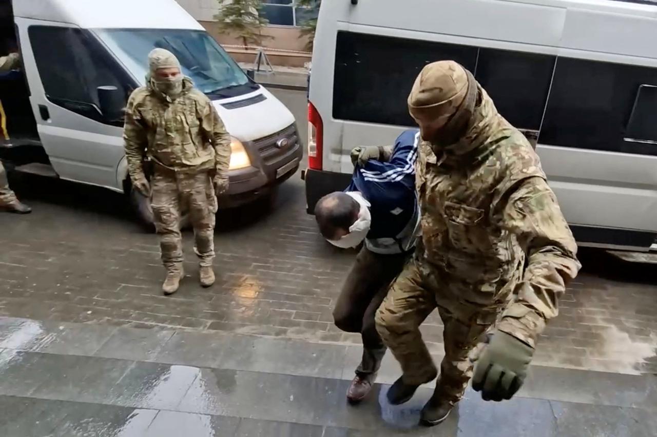 Suspects in the Crocus City Hall shooting are brought to the Investigation Committee's headquarters in Moscow