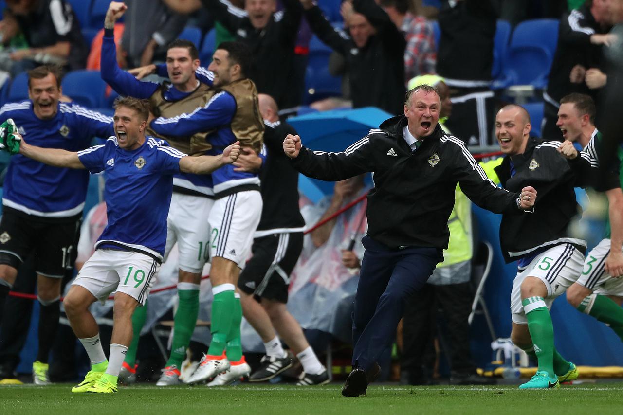 Northern Ireland v Ukraine - UEFA Euro 2016 - Group C - Parc Olympique LyonnaisNorthern Ireland manager Michael O'Neill (second right) celebrates after Northern Ireland's Niall McGinn (not in picture) scores his side's second goal of the game during the U